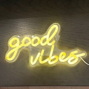 Yellow 'Good Vibes' Neon Sign